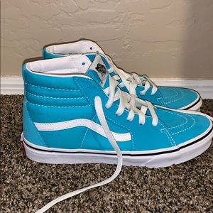 Turquoise high top vans